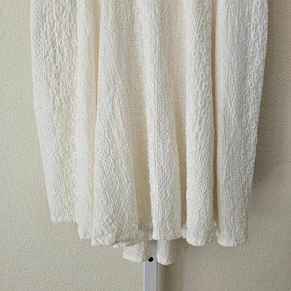 CLEOBELLA Violet Embroidered Spaghetti Strap V-Neck Bow Smocked Mini Dress Sz M - Picture 6 of 16